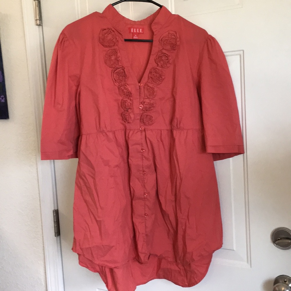 Coral colored tie back blouse with roses